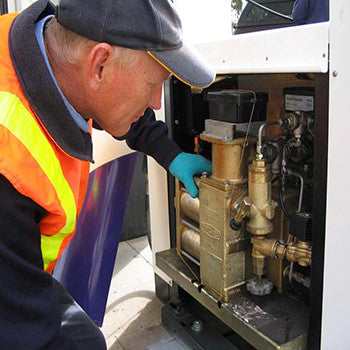 inspector looking at an LPG dispensers